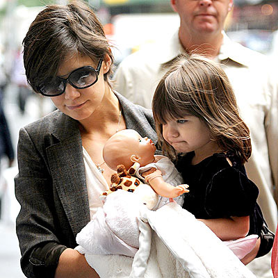 Suri Cruise and Katie Holmes Some say that Suri never plays with children 