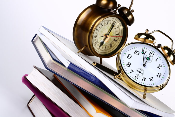 700-books-time-clock-alarm-sleep-learn-teach-read
