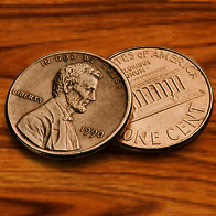 Two 1 Cent Coins on the Table