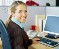 Woman Sitting in front of Computer