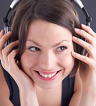 Woman Listening to Music in Headphones