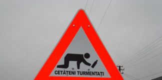 A Road Sign Warning about Wandering Drunks