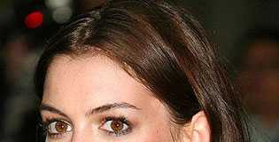 Anne Hathaway Tries on a Boyish Hairstyle