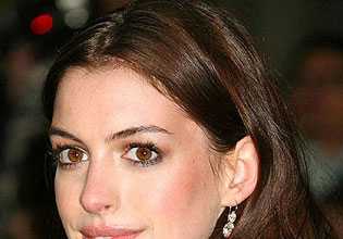 Anne Hathaway Tries on a Boyish Hairstyle