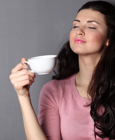 Woman drinks coffee