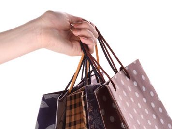 Why Do Women Buy Expensive Clothes & Accessories?