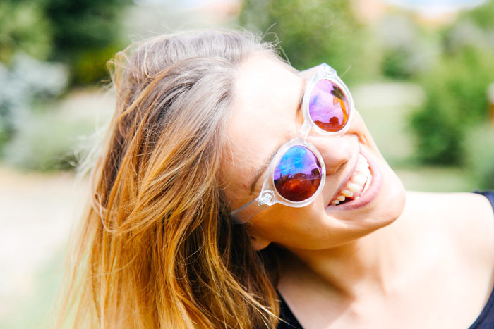 woman-smile-eyeglasses-sunglasses-hair-summer