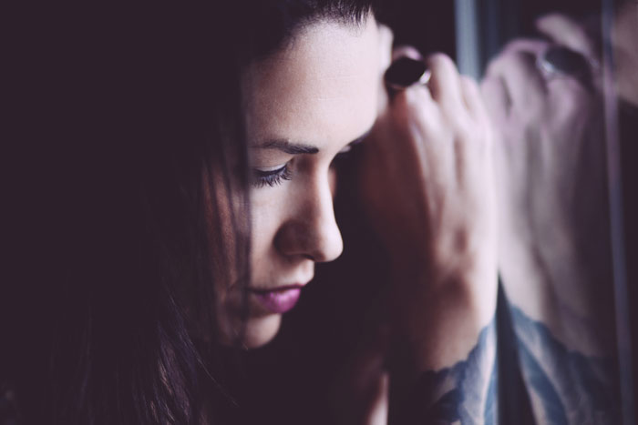 sad-woman-window-cry-depression-breakup