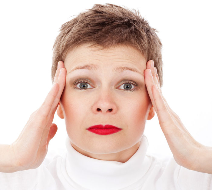 stress-ache-pain-headache-woman-scared-angry
