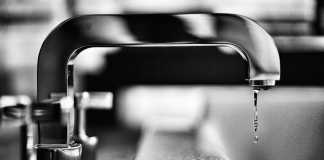 How Do I Protect My Home From a Water Damage Disaster While Traveling?